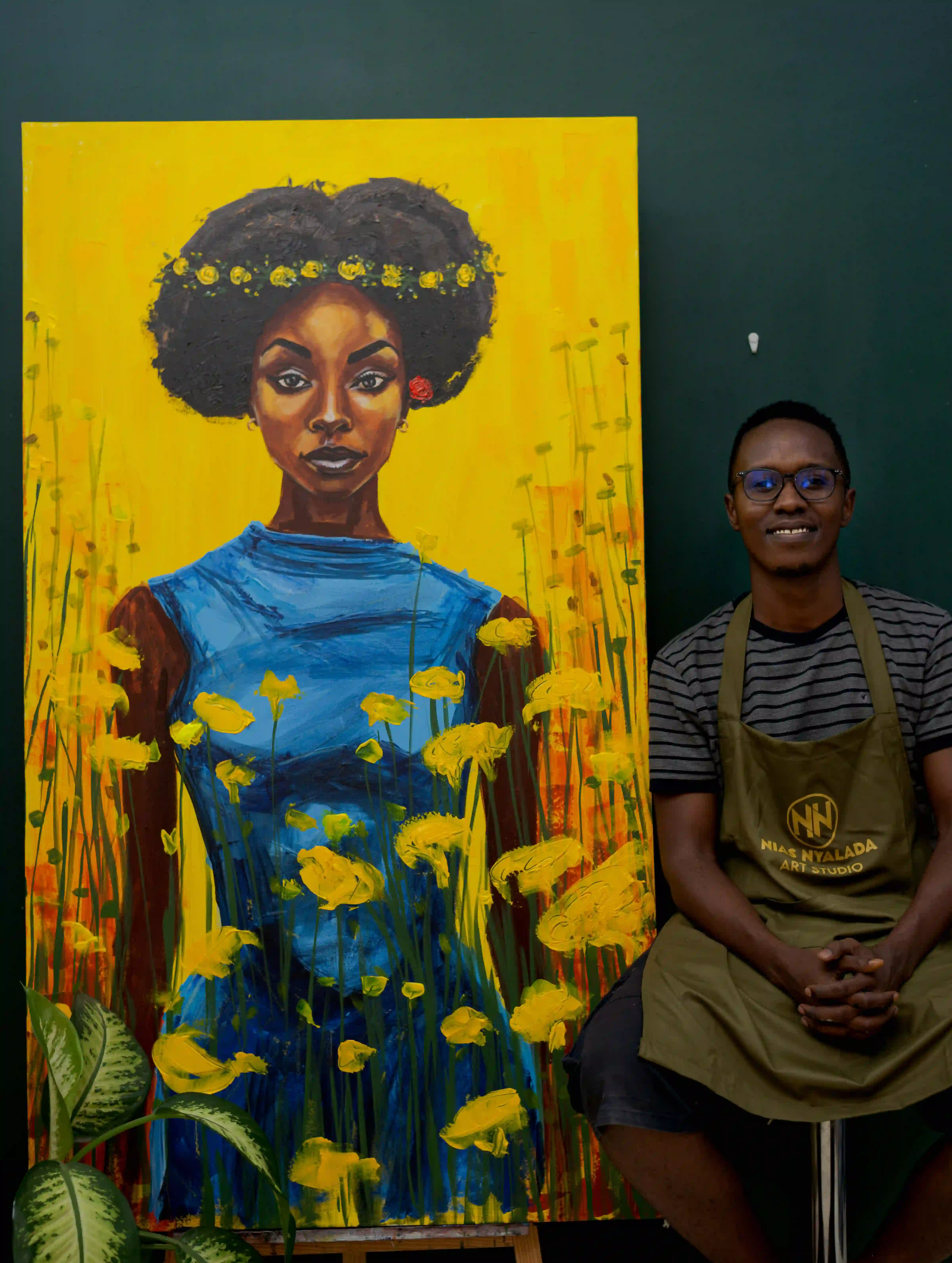 Nias Nyalada painting in studio